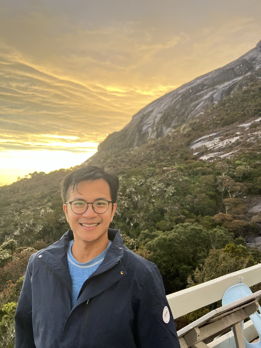 Portrait of Liang Wei outdoors at sunset